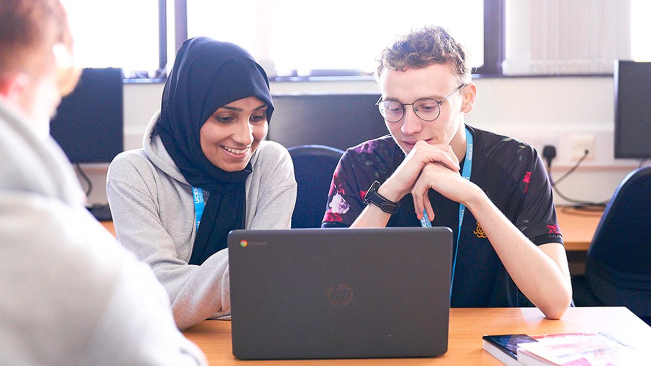 Photograph of UCEN Manchester student, Ben Goldsmith, in a classroom setting.