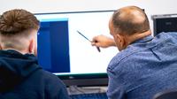 A tutor helping a student