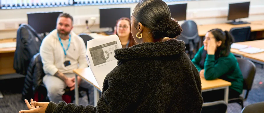 A group of UCEN Manchester students working together