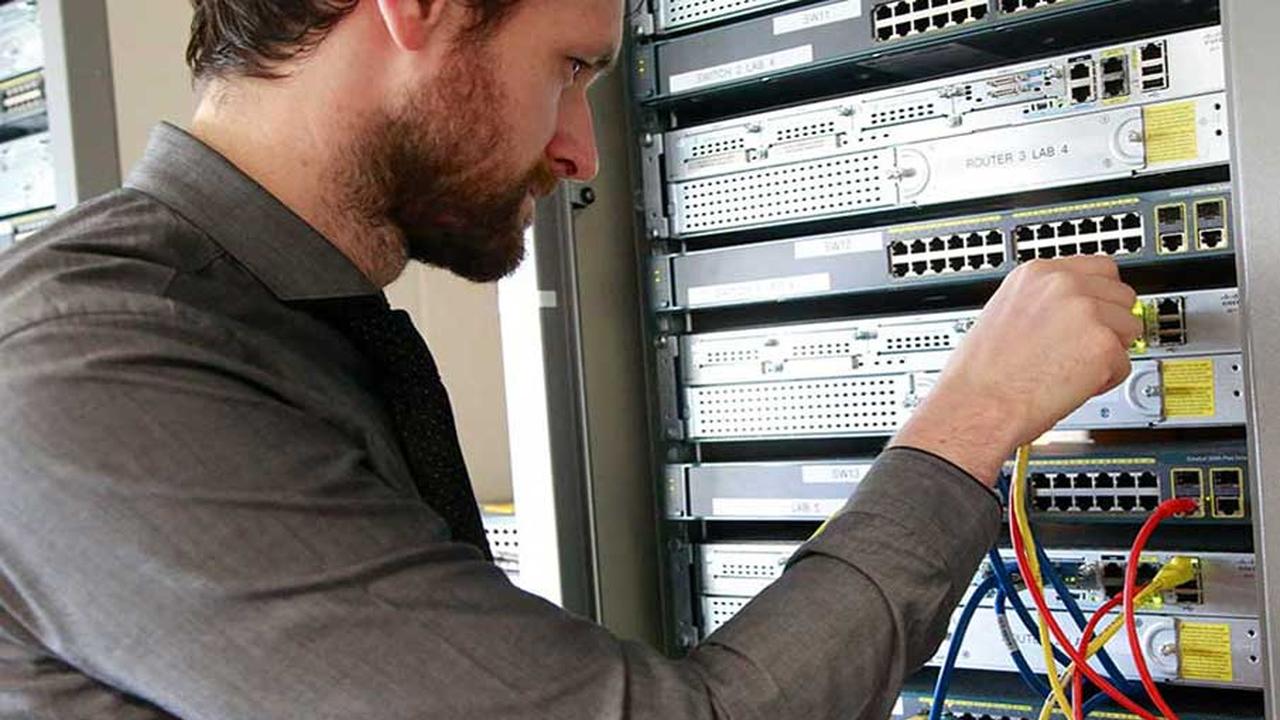 Man looking at a server