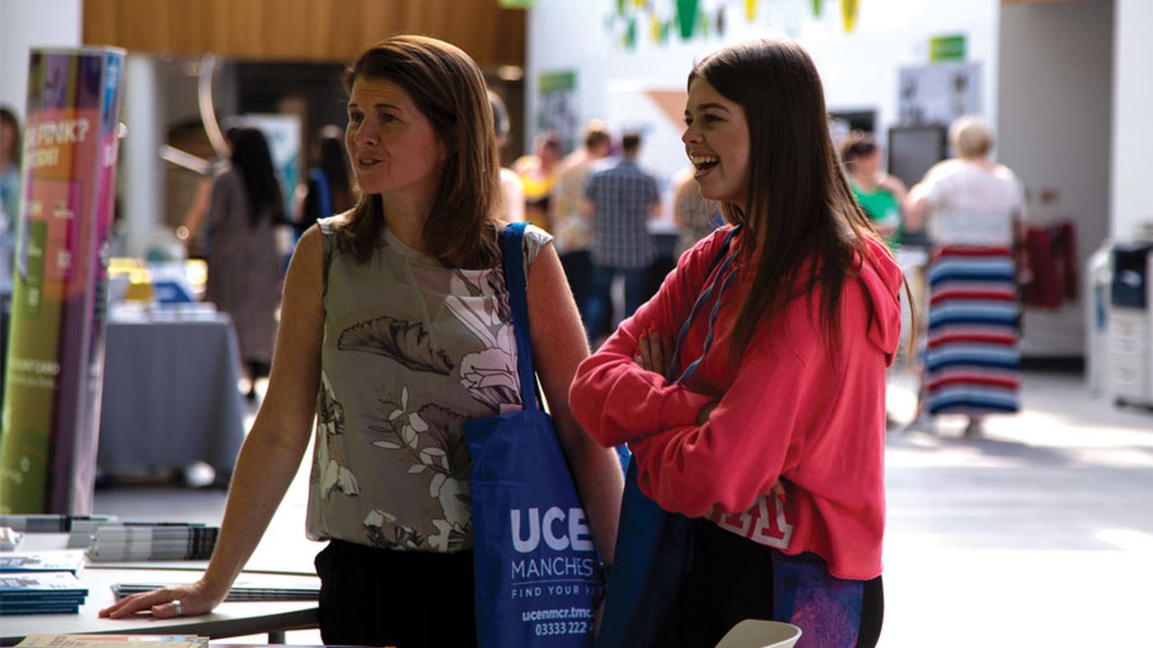 A parent and student visiting a UCEN Manchester Open Day