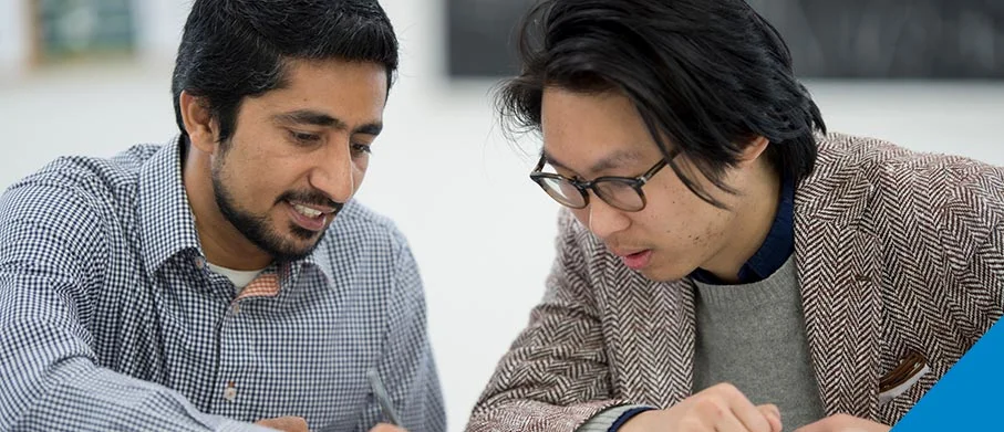 A tutor helping a learner