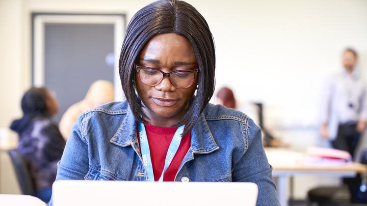 A learner focused on their work