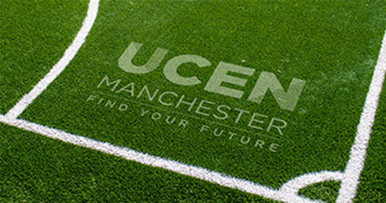 A football pitch that spells out "UCEN Manchester"