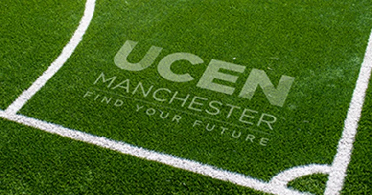 A football pitch that spells out "UCEN Manchester"