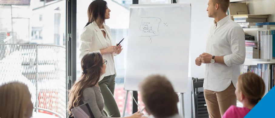 A group of people talking to each other