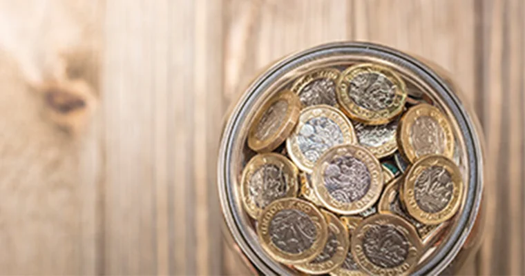 A pot full of pound coins