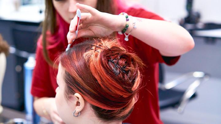 Make up student styling hair