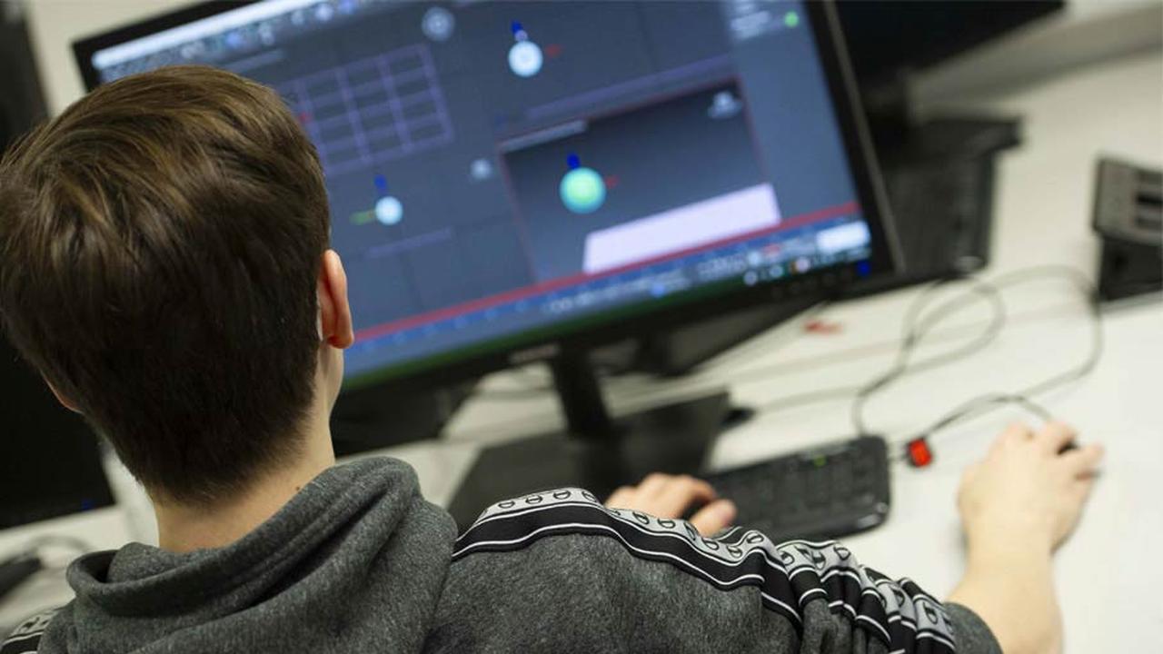 A student working at their computer