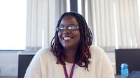 A smiling healthcare learner