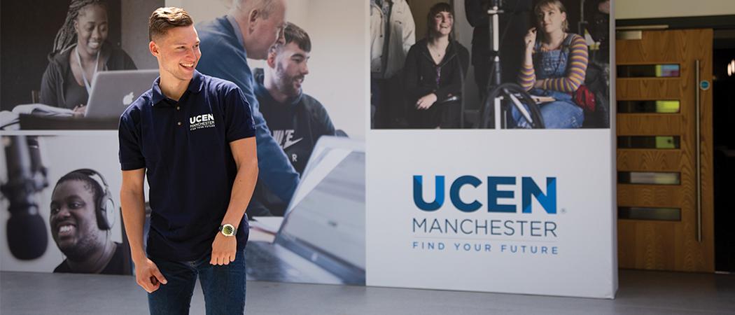 A UCEN manchester rep smiling at an open event