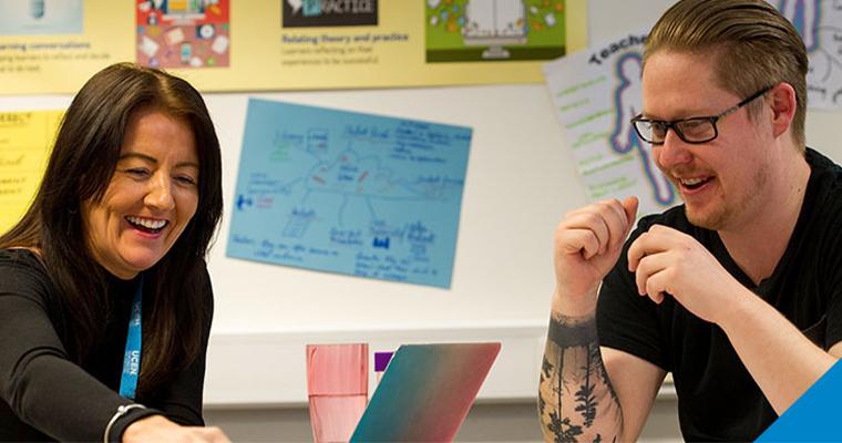 A learner and a tutor laughing together