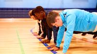 UCEN Students doing press ups in the sports hall