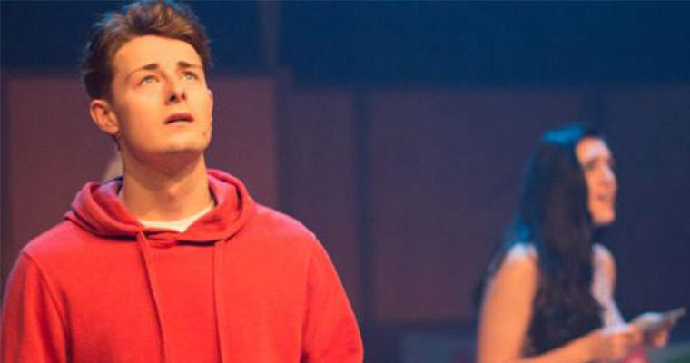 The Arden students performing on stage