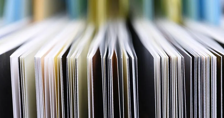 Vertical stacks of paper