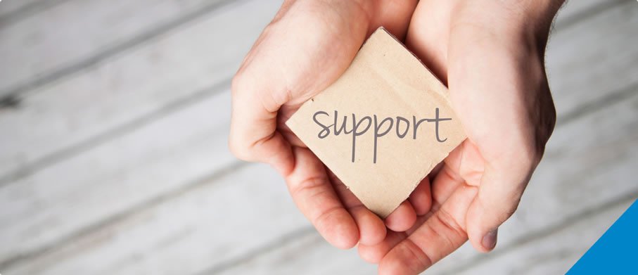 A hand holding a piece of paper titled "support"