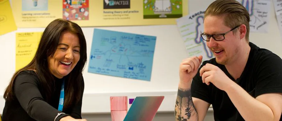 A tutor giving advice to a student