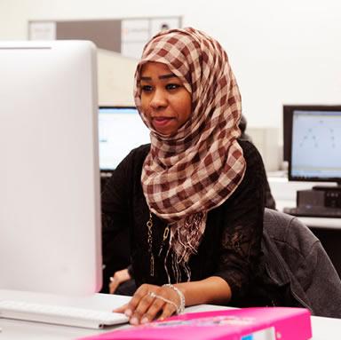 A woman working on a computer