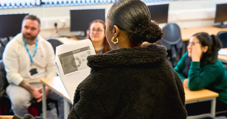 A group of UCEN Manchester students working together