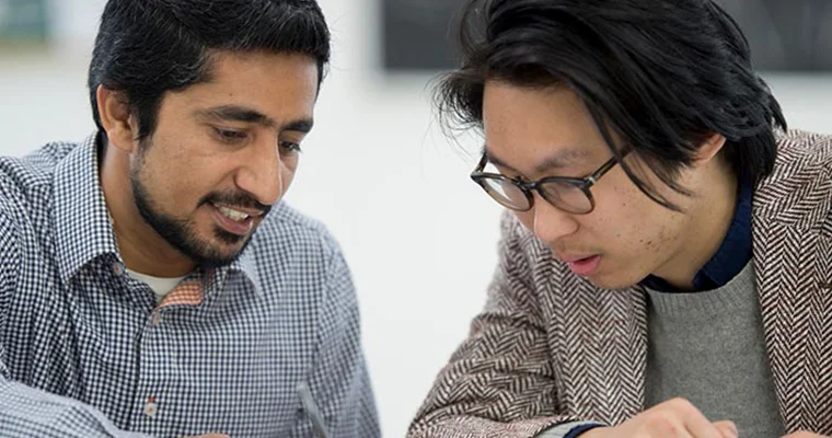 A tutor helping a learner