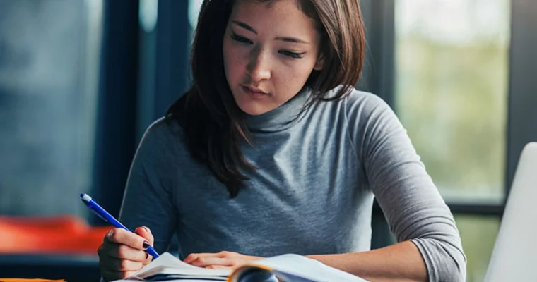 Learner working at a desk