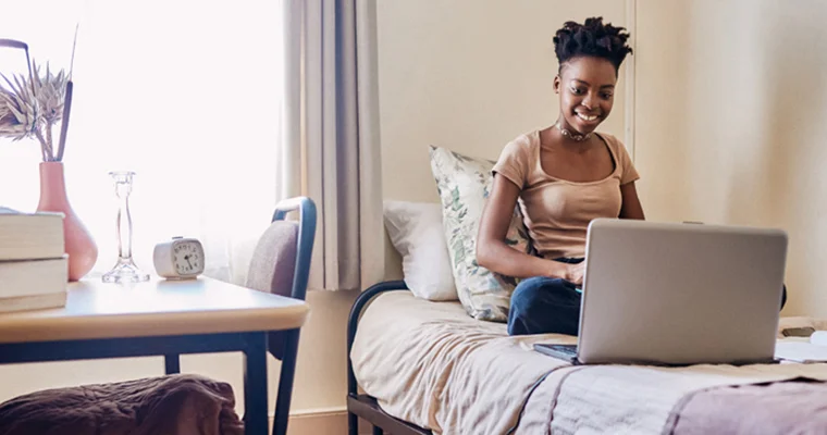 A student working in their apartment