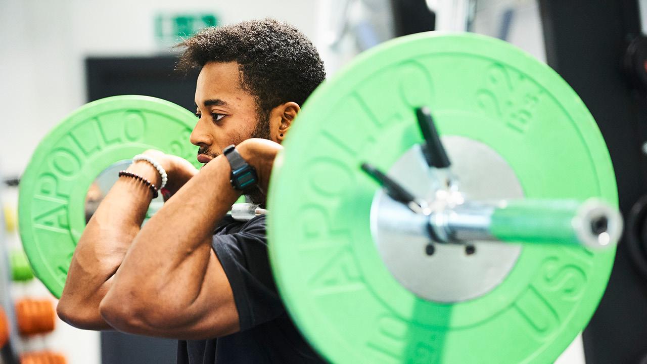 Close-up of a student do olympic lifting