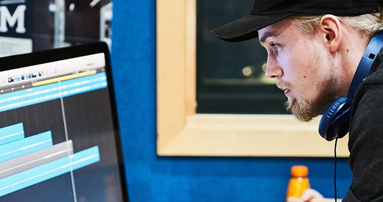 A student looking at a computer screen