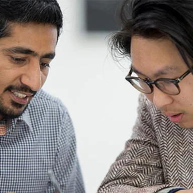 A tutor providing assistance to a student