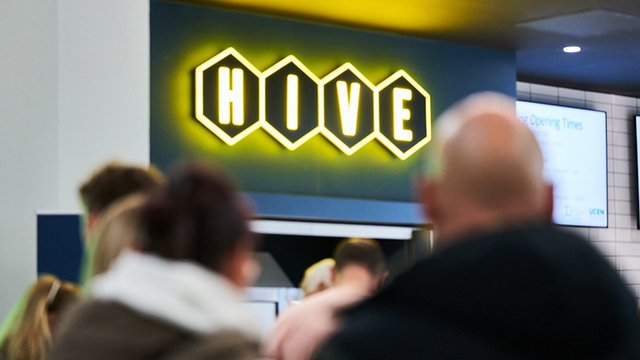 Photograph of the signage for the Hive Bar located inside City Campus Manchester.